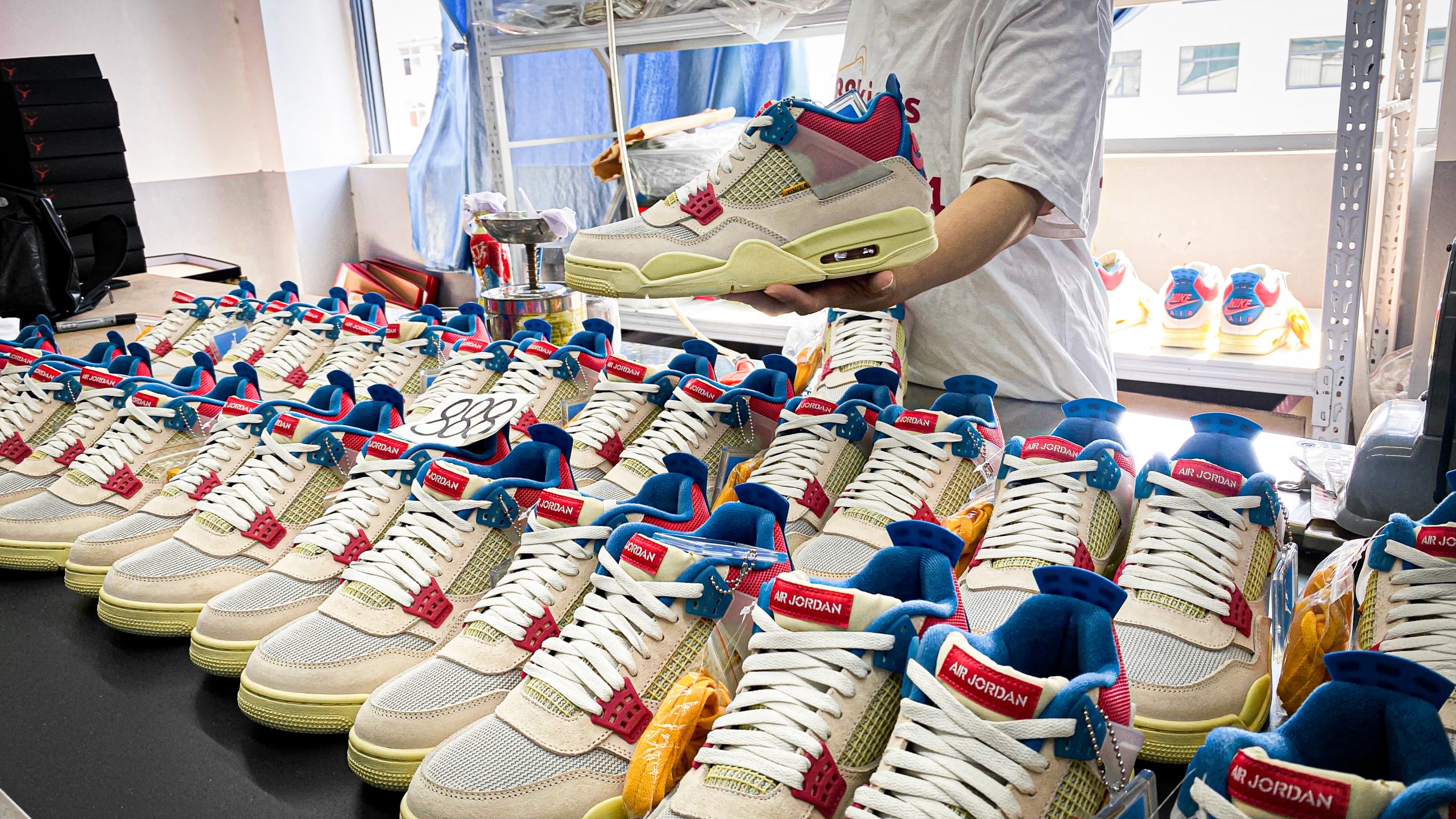 Jordan 4 Retro Union Guava Ice