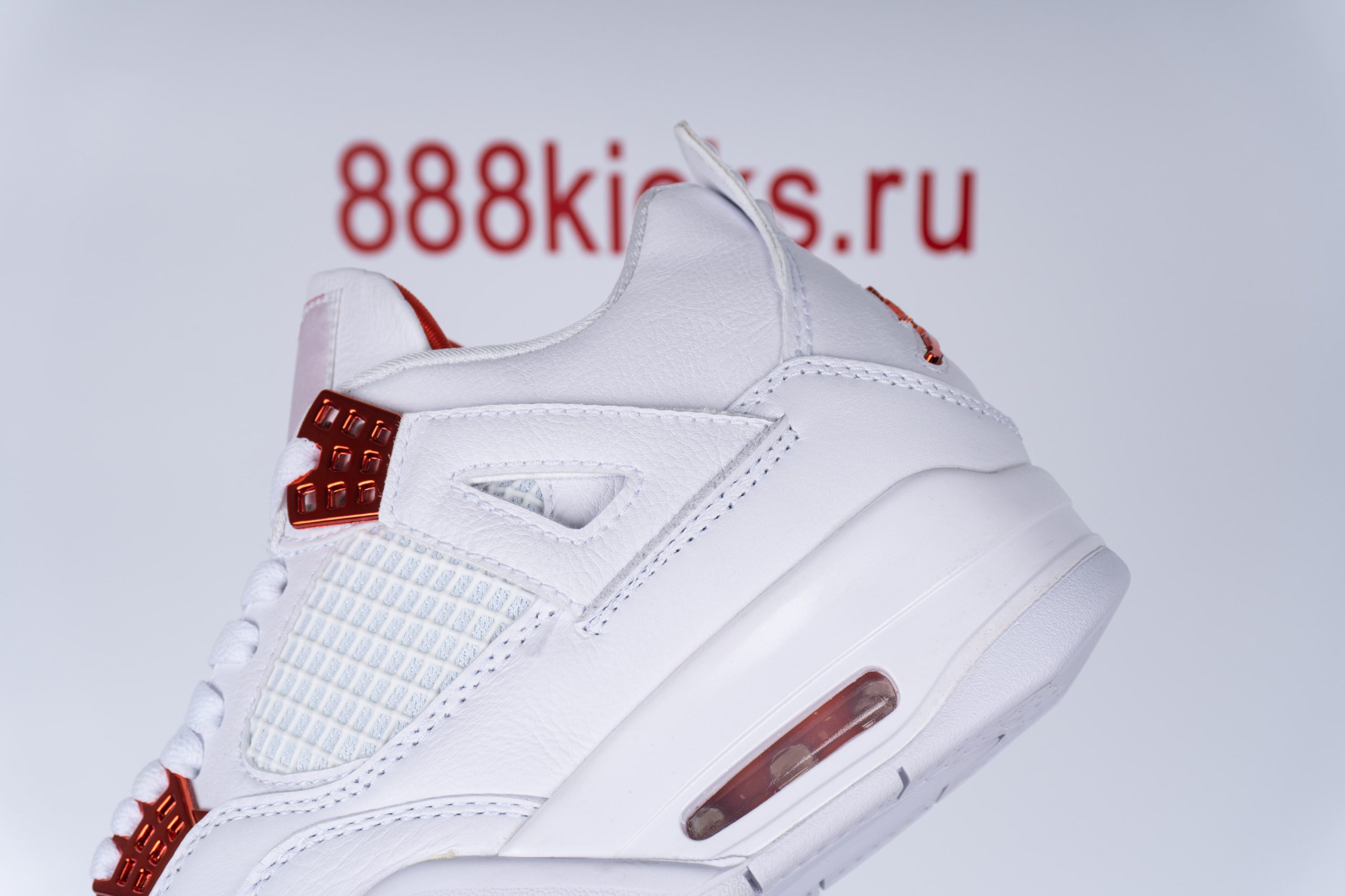 Jordan 4 Retro Metallic Orange