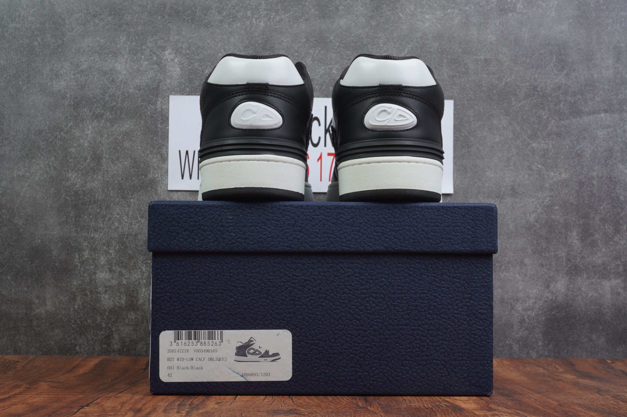 D*or b57 mid-top sneaker black and white